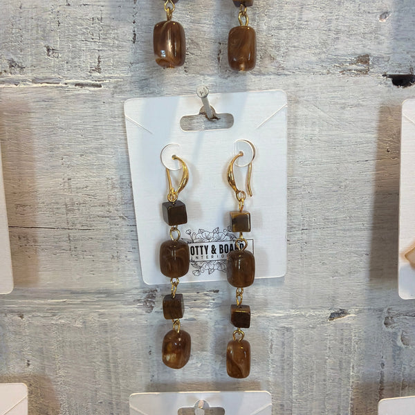 Artisan Long Tassel Drop Earrings with Tiger Eye displayed on branded card, featuring brown stone beads and gold-tone hooks, perfect for gifting or adding to jewelry decor.