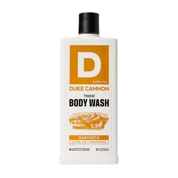 Bottle of Duke Cannon Body Wash, 18 oz., Sawtooth scent with alpine air and cedarwood, offered by Knotty and Board, perfect for adding a rugged touch to any bathroom decor or gift collection.