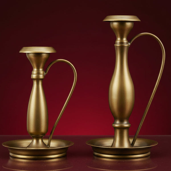 Traditional Bronze Metal Candle Holder, Large, 9 in. with elegant curved handle and smooth finish, perfect for adding classic decor and warmth to any room from Knotty and Board.