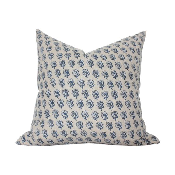 A decorative Aster Floral Throw Pillow, Indigo, 22 X 22 in. featuring a repeating indigo floral pattern on a light background, perfect for adding charm to any room.