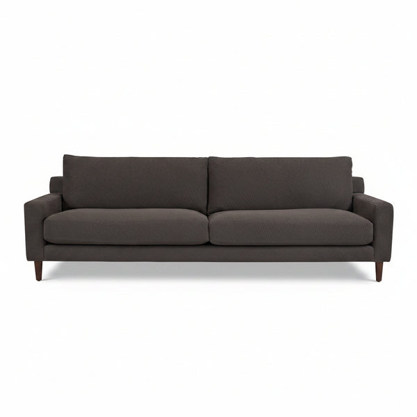 Dark gray sofa on a white background