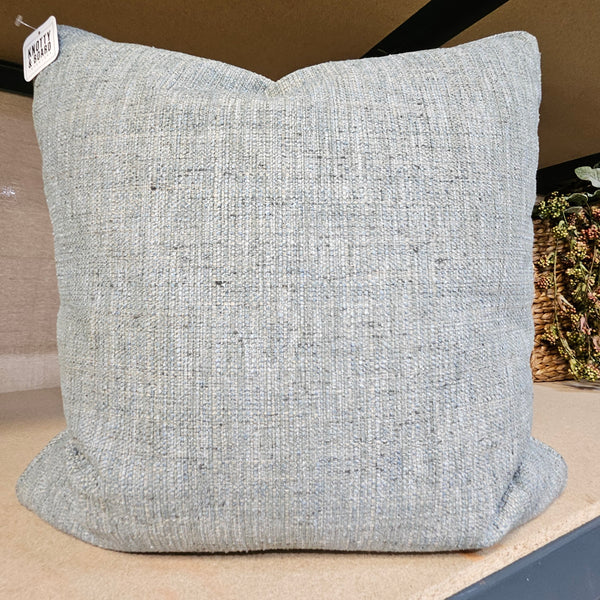 Soft textured blue fabric pillow from Designer Pillow Line Kawnee Blue, perfect for adding comfort and style to your home decor with subtle elegance.