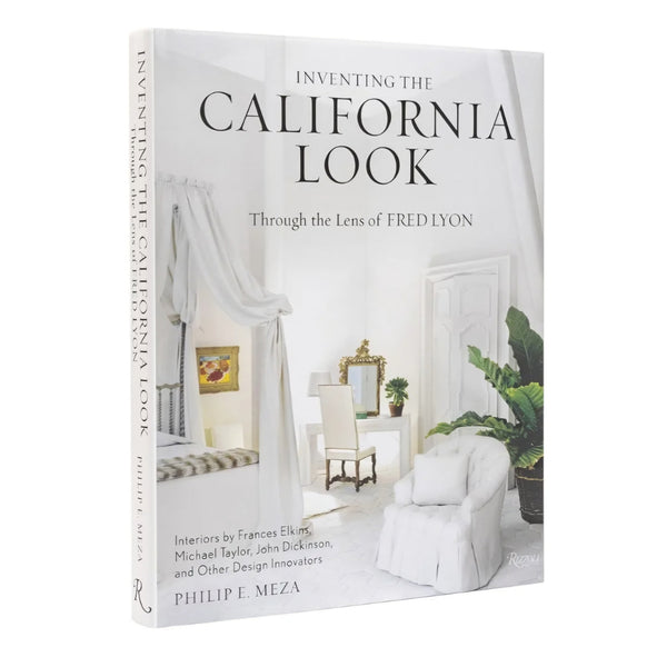Inventing the California Look book cover featuring a bright, airy interior with white furniture, soft drapery, green plants, and a minimalist design aesthetic.