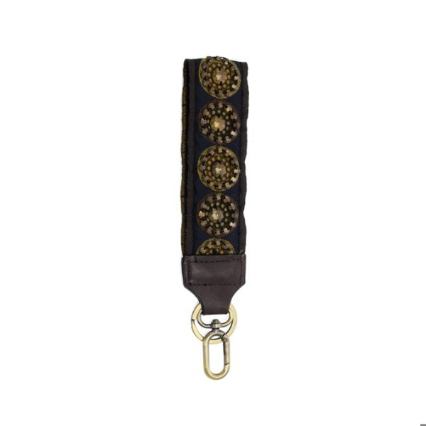 Easy Find Wristlet, Navy Hand Nailed featuring navy fabric with decorative gold-toned hand-nailed accents and leather detail, perfect for stylish organization and gifting from Knotty and Board. Every Room Needs A Little Knotty and Board.
