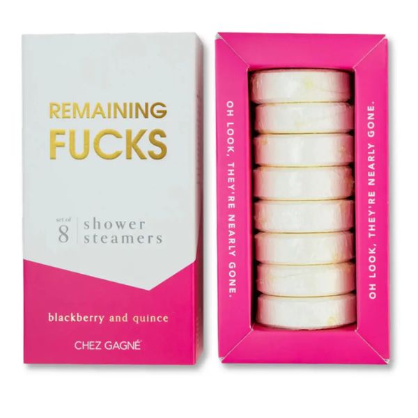 Packaged set of eight Shower Steamers, Remaining F*cks, Blackberry Quince scent, featuring white round tablets in a pink and white box with gold and white text, stylish home decor gift idea.