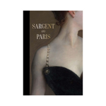 Close-up of a woman in an elegant black dress with beaded straps, showcasing refined style and sophistication, featured in Sargent and Paris. 1