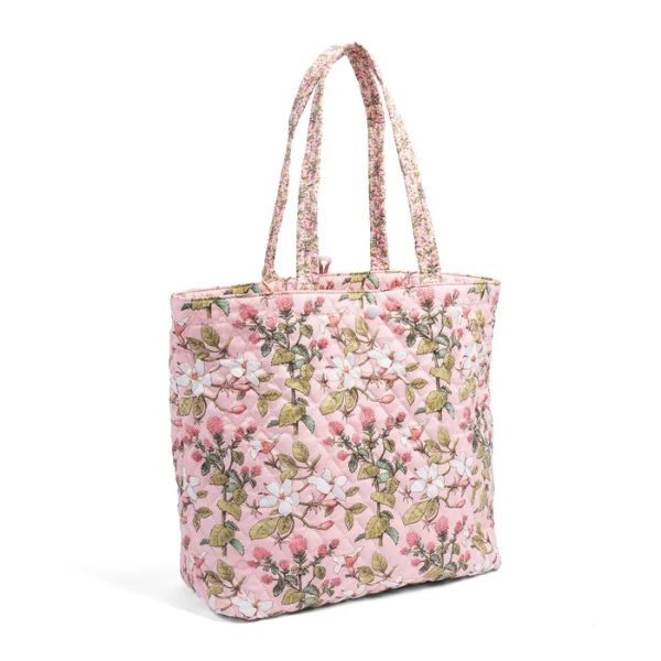 Quilted floral tote bag in soft pink with green and white blossoms, featuring long handles for easy carrying, perfect for stylish everyday decor and gifts - Tote Bag, Jasmine Joy.