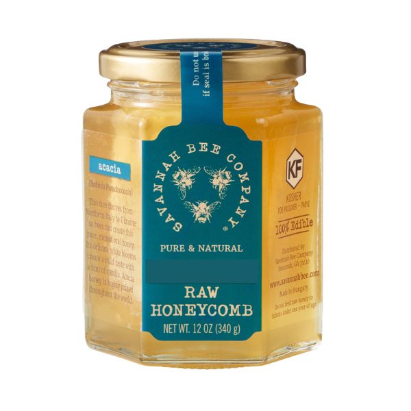 Savannah Bee Co., Raw Honeycomb, Hex Jar, 12 oz. shown with golden natural honeycomb inside a hexagonal glass jar, ideal for kitchen gifts and entertaining with Knotty and Board decor.
