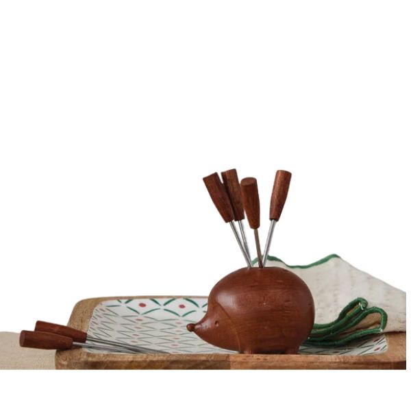Wood Hedgehog Shaed Holder with (6) Appetizer Picks displayed on a decorative plate with napkins, perfect for kitchen entertaining and unique decor from Knotty and Board.