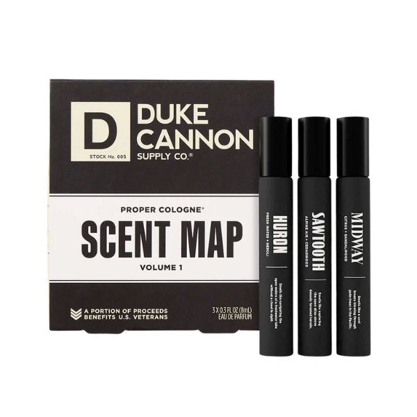 Black boxed Duke Cannon Proper Cologne® Scent Map, Set of Three, 3 oz. with three black cologne bottles labeled Huron, Sawtooth, and Midway, sold by Knotty and Board, offering decor and gifts.