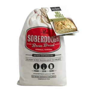 A bag of Soberdough Brew Bread, Dill Pickle artisan beer bread mix with a rustic label, perfect for kitchen gifts from Knotty and Board, adding charm to dining and entertaining.