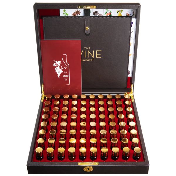 Luxury wooden display case open to reveal multiple small glass vials with golden caps and a booklet, showcasing the Wine Aroma Kit 80-Fragrance Training Kit For Wine Sommelier, a perfect gift from Knotty and Board for wine enthusiasts and decor lovers.