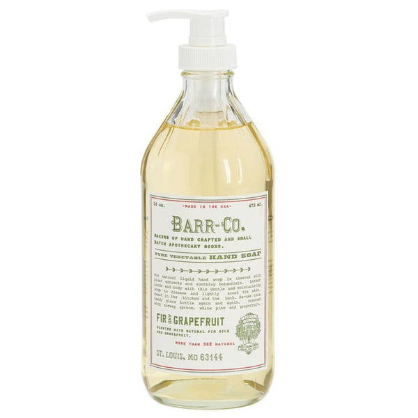 Clear pump bottle of Barr Co 16 oz Hand Soap, Fir/Grapefruit with natural pale yellow liquid inside, featuring a rustic label and perfect for kitchen or bathroom decor by Knotty and Board.