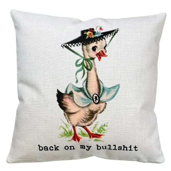 Funny Vintage Pillow, Back On My Bullshit, featuring a retro-style duck in a hat with floral accents, perfect for adding humor to home decor and gifts from Knotty and Board.