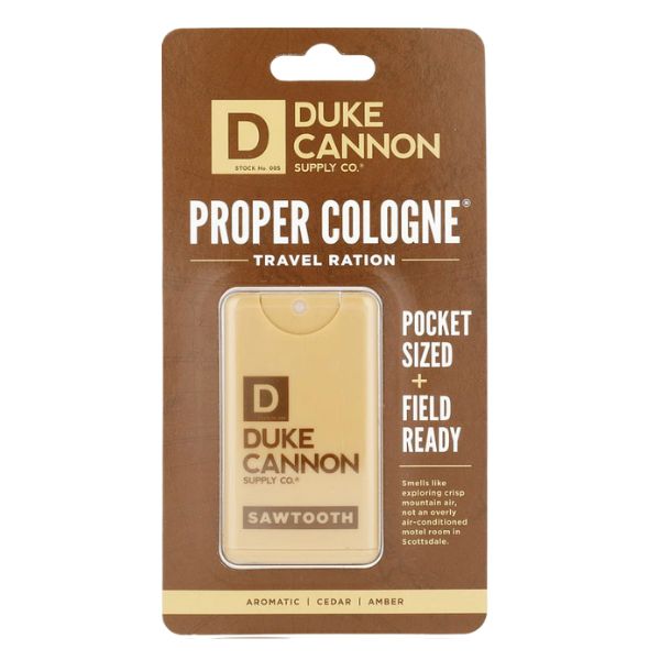 Duke Cannon Travel Size Pocket Cologne, 0.34 oz., Sawtooth in compact packaging with aromatic cedar and amber scent, available at Knotty and Board for unique gifts and decor.