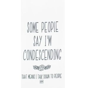 White kitchen towel with black text reading "Some People Say I'm Condescending Tea Towel" and a humorous phrase below, decorated with a small floral design, perfect for kitchen decor and gifts from Knotty and Board.