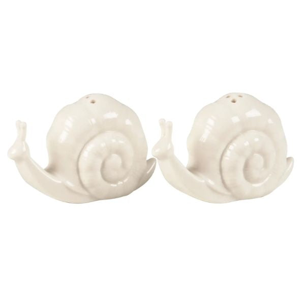 Pair of white ceramic Snails Salt and Pepper Shakers with a glossy finish, perfect for adding whimsical charm to kitchen decor or entertaining by Knotty and Board.